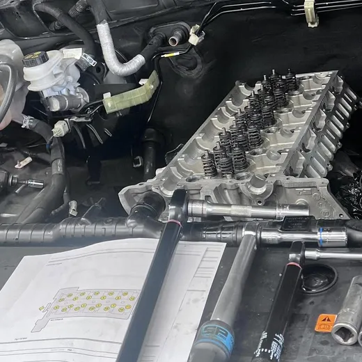 Cylinder head repair in progress at Waiwakaiho Auto Services