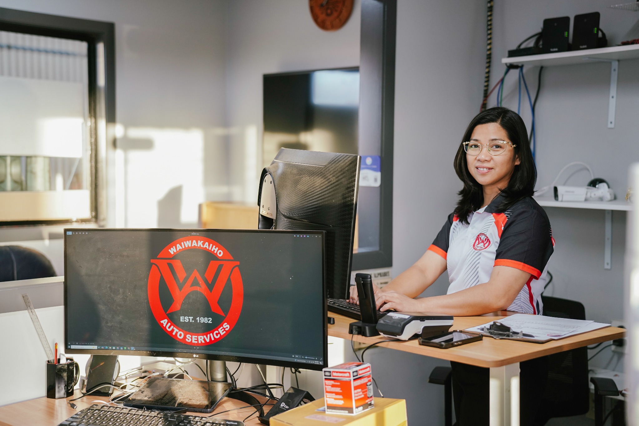 Nancy at the Waiwakaiho Auto Services front desk in New Plymouth